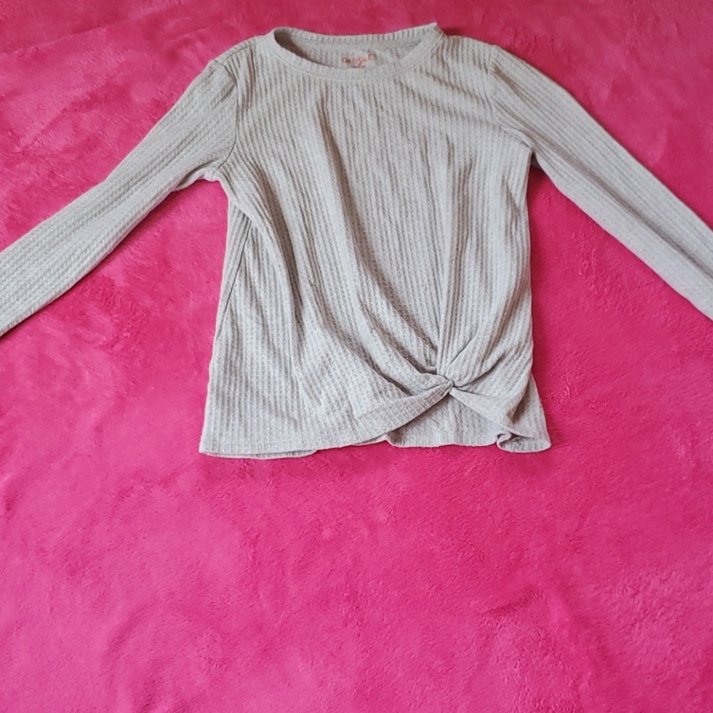 Sweater with tie in the front
